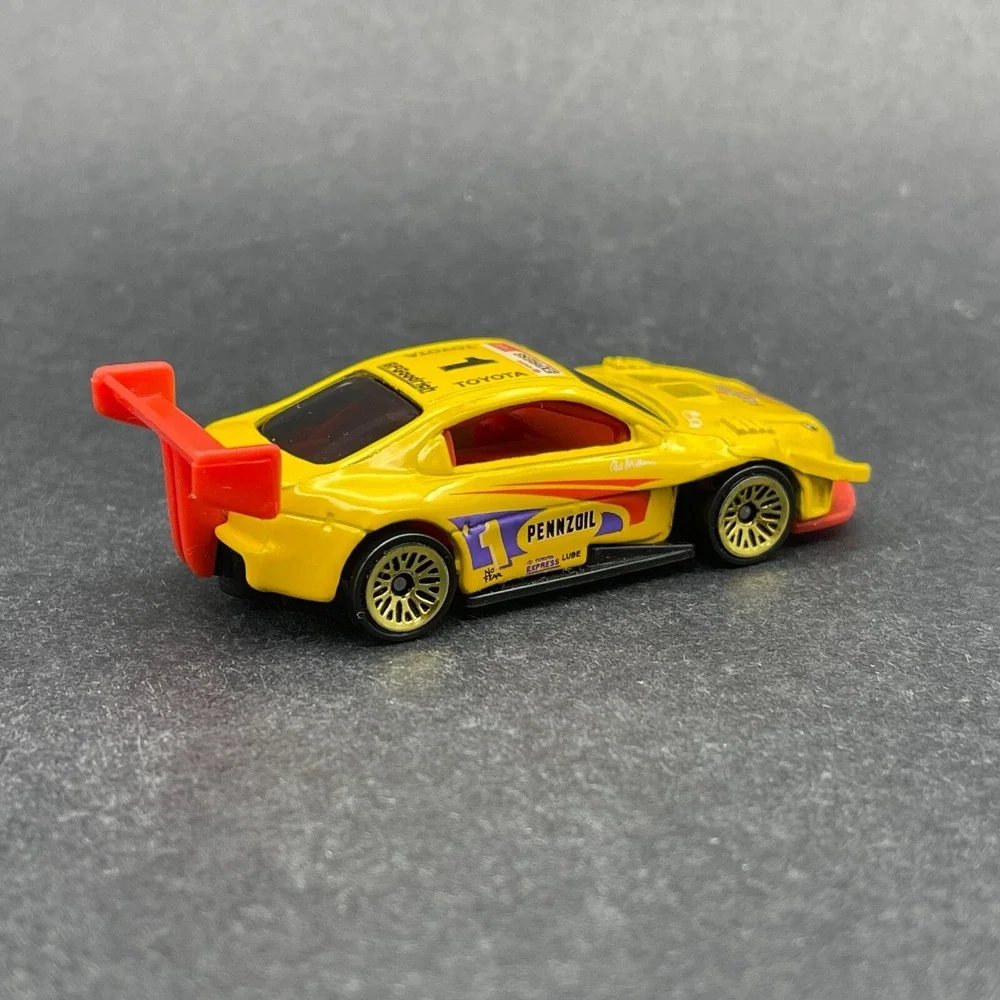 Hot Wheels Pennzoil #1 Toyota Pikes Peak Celica Race Car Yellow Diecast 1/64